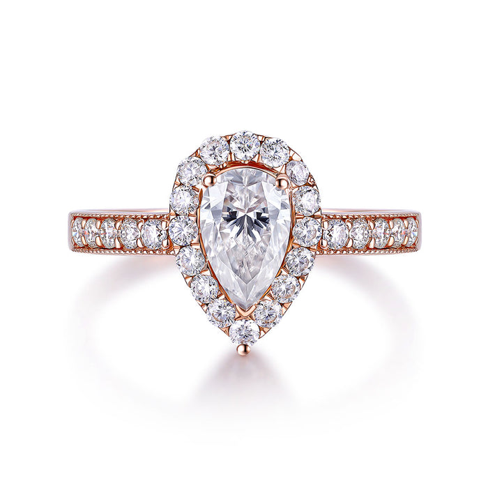 Moissanite Pear Ring with Halo in Rose Gold | Affordable Brilliance - Crafting Your Dream Engagement Ring with Stunning Moissanites | Saratti