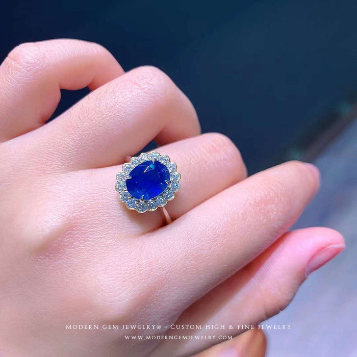 Natural Sapphire and Diamond Cocktail Ring on Model's Finger - From the Earth to Your Jewelry Box - The Story of Virgo's September Birthstone - Saratti